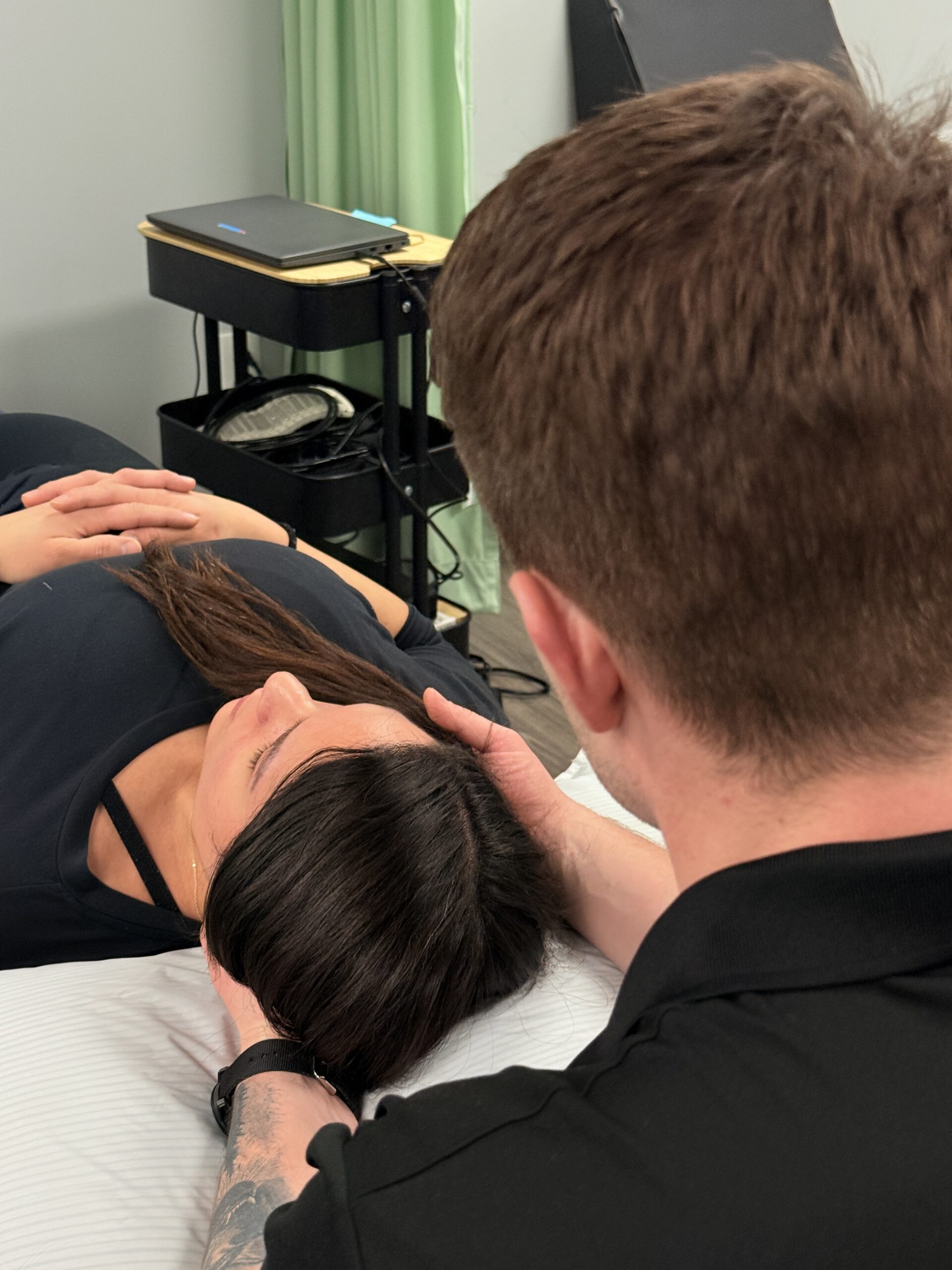 Our Manny Candaele providing personalized athletic therapy for the neck in Winnipeg